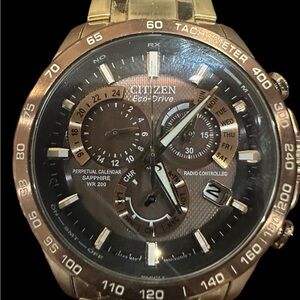 Citizen Eco-Drive Gold and Brown Chronograph Watch. Radio Controlled
